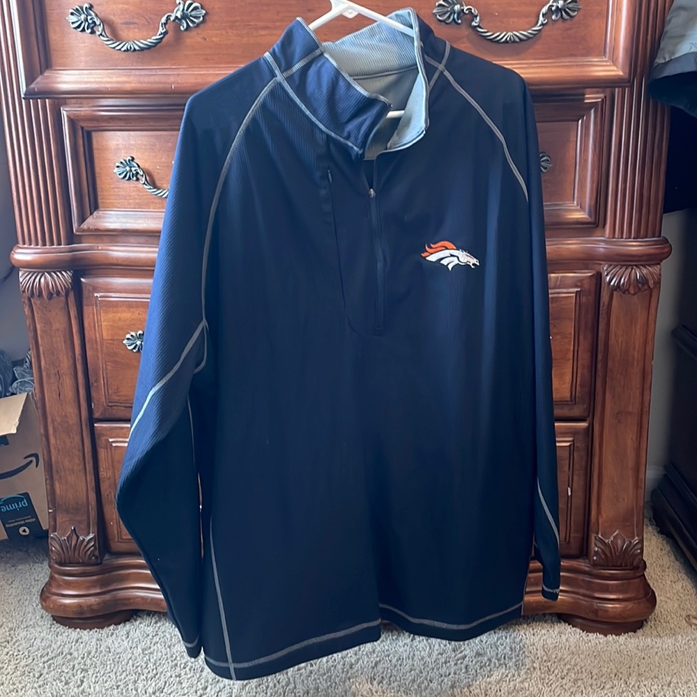 Dark blue zip up sweater. Bronco stitchd on. Man’s extra large.